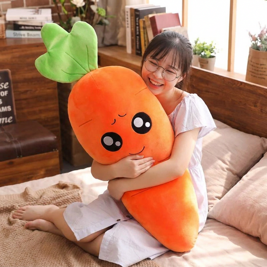 Person holding the long carrot plush throw pillow