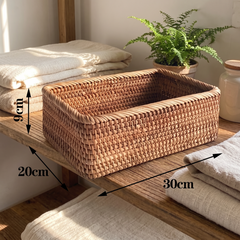 Handwoven rattan storage basket, Large, natural lived-in home setting